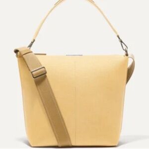 Rothy’s Mini Zip Bucket Bag in Butter Yellow